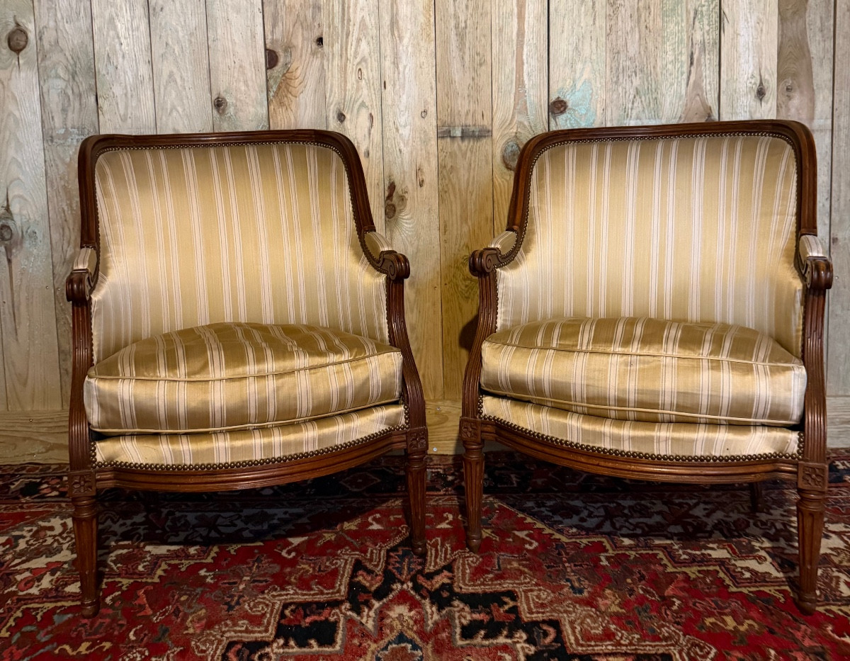 Paire de bergères gondoles d’époque Louis XVI en bois naturel