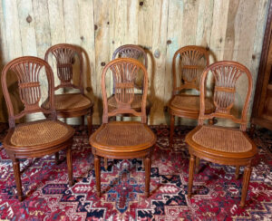 Suite de six chaises de style Louis XVI « À la gerbe de blé »