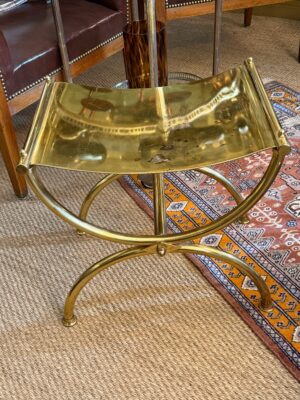 Tabouret curule en laiton massif doré, dans le goût de la Maison Jansen